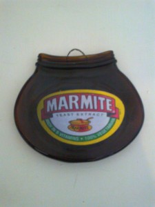 flattened Marmite jar to hang on the wall