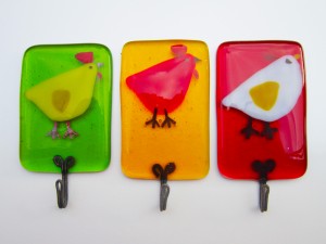 Glass tea towel holders with colourful chicken design