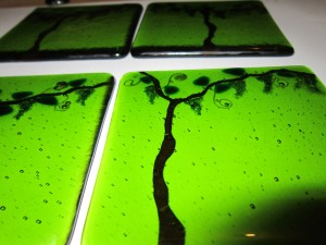 set of coasters with grapevine design