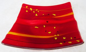 Centerpiece for dinner table with red and yellow motif