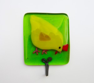 green chicken pecking tea towel holder