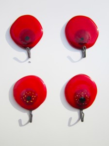 tea towel holders with poppy design