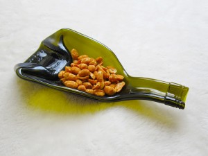 Squashed wine bottle as tid bits holder 