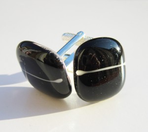 black cufflinks with white line
